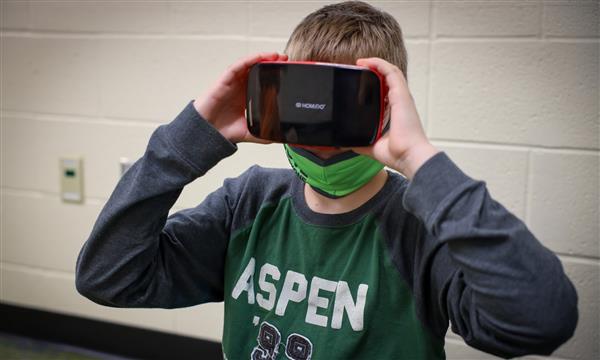 Students use virtual reality headsets